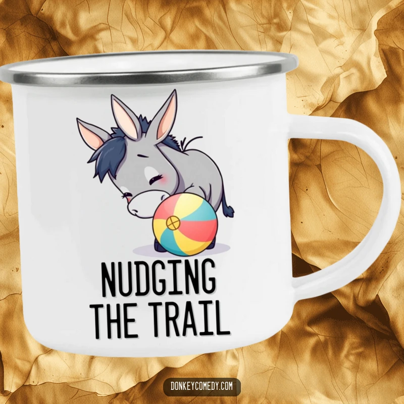 Funny donkey camping mug showing a playful donkey nudging a colorful ball with its nose, ready for outdoor enjoyment.