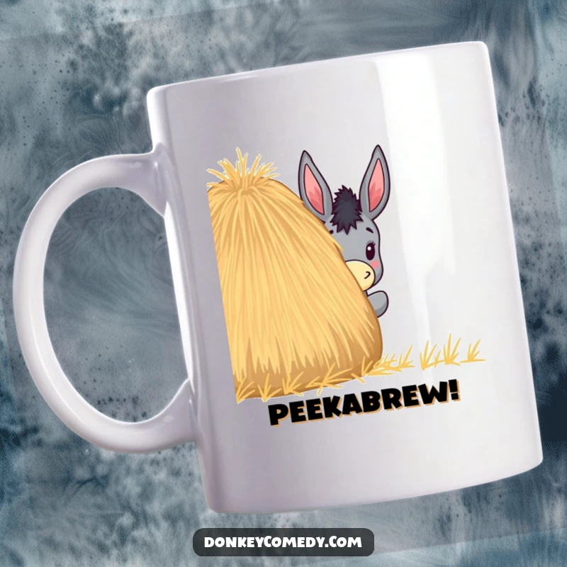 Funny mug graphic of a curious donkey peeking its head out from behind a large, round haystack in a playful manner.