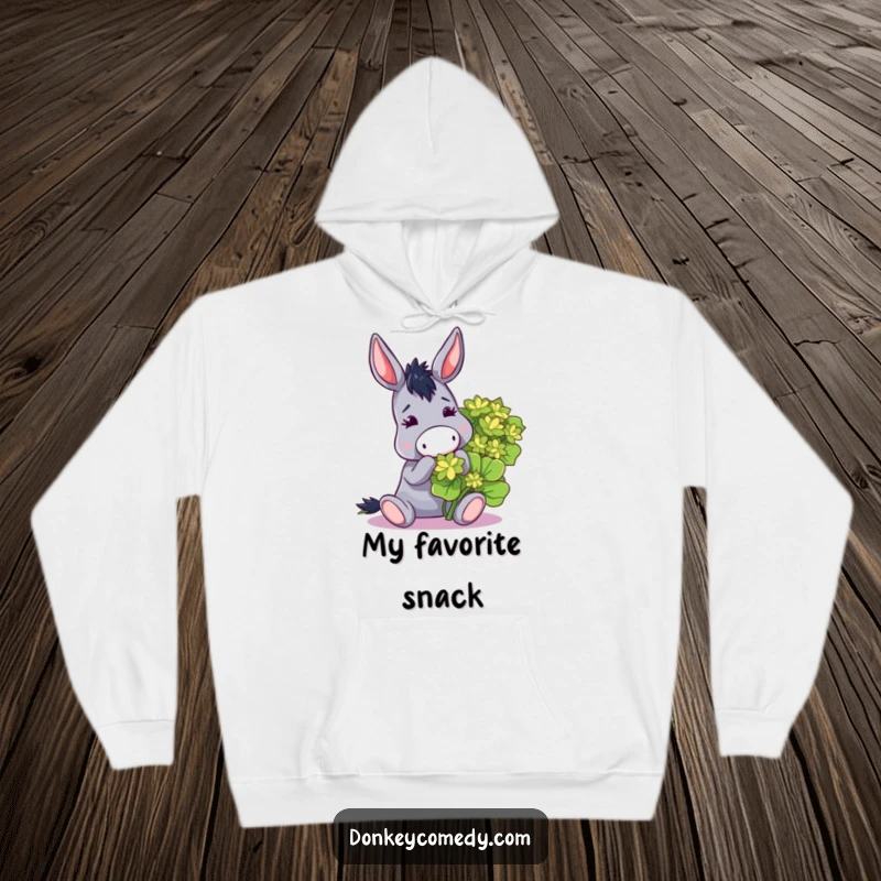 Funny hoodie with a donkey playfully munching a giant clover, exuding playful charm and cozy vibes.