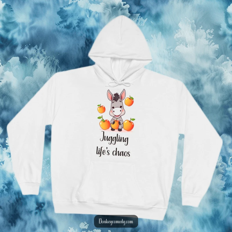 Funny Donkey Hoodie: A donkey with a mischievous grin juggles apples, bringing cozy humor and fruit-themed fun.