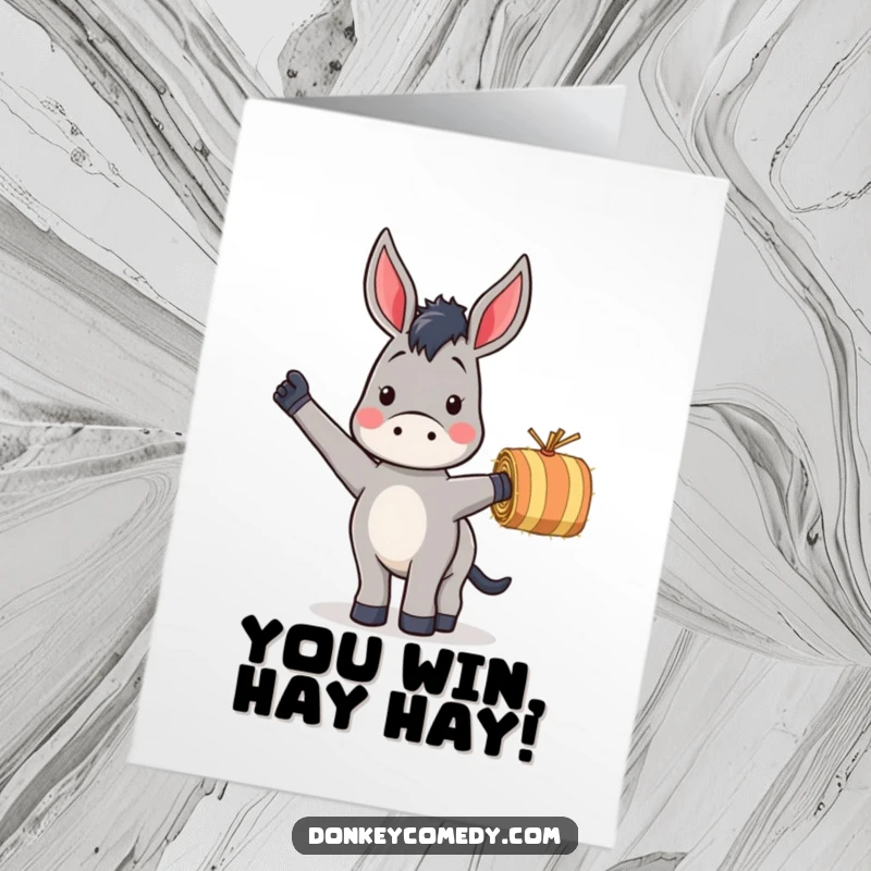 Funny Free Printable Congratulations Card of a donkey joyfully waving a small, striped hay bale, celebrating success.
