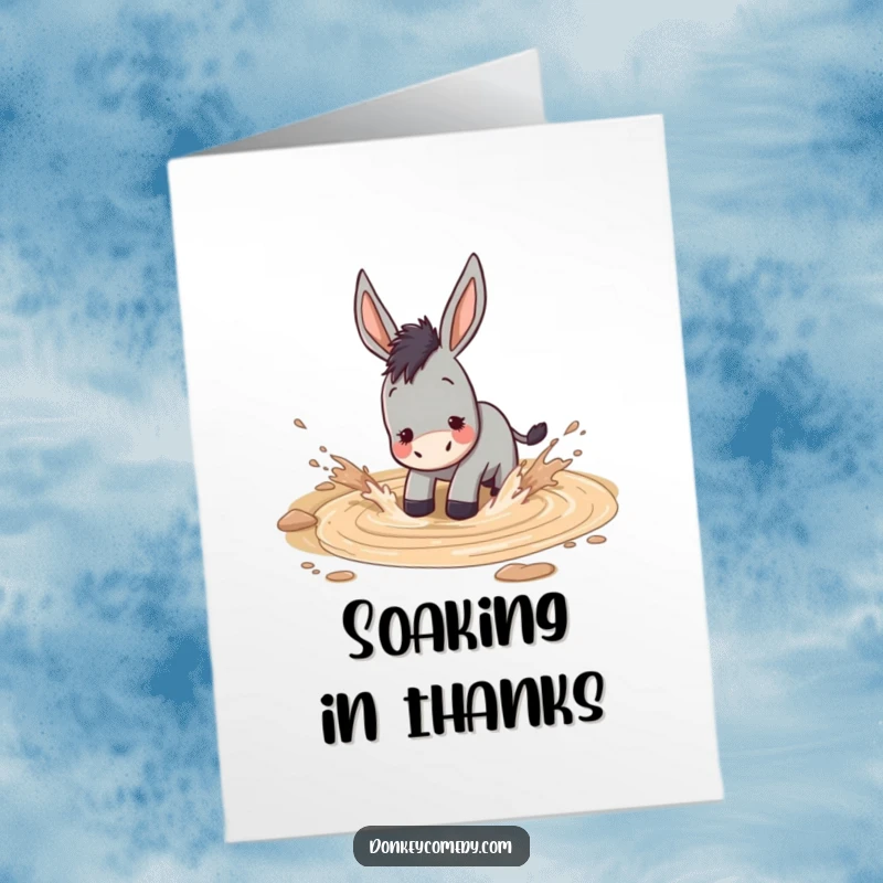 Funny Free Printable Thank You Card: A donkey is having a blast, splashing energetically in a large, muddy puddle.