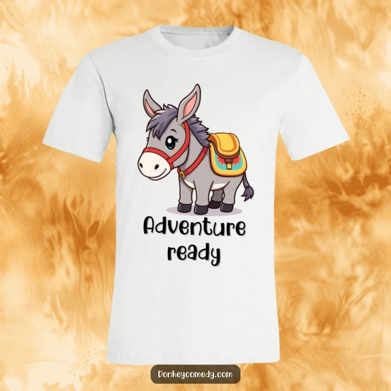 Funny T-Shirt of a kawaii donkey wearing a colorful saddle, looking eager and ready for any journey, full of charm.
